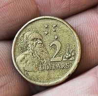 Reverse side showing Aboriginal elder, Southern Cross, denomination 2 DOLLARS