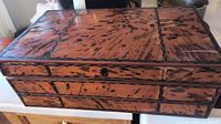 Exterior of mottled tortoiseshell-finish wooden box