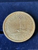 Reverse of 2000 Sacagawea Dollar showing eagle and denomination