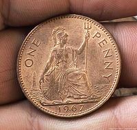 Reverse showing seated Britannia with year 1967