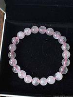 rose quartz bracelet in black box