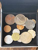 Top view of all coins in black box