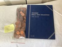 Album cover and bag of pennies
