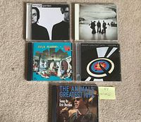 Front view of all five CDs showing cover art