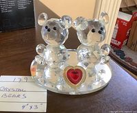front view showing two crystal bears, heart accent and measurement note