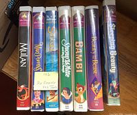 Spine view of all seven VHS tapes