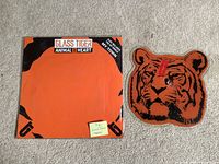 Front view of shaped vinyl and sleeve together