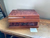 Closed wood jewelry box exterior