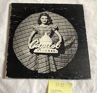 Front of sleeve showing model and Capitol logo