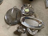 group shot showing all six silver-plated pieces