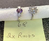 Both sterling silver rings on tissue roll, showing side profile and note indicating quantity