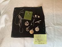 Overview of all sterling silver pieces on black cloth