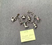 Full view of bracelet showing all six charms