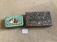 Both boxes side by side showing tops