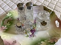 Overall view of porcelain plate with all crystal shakers and cellar