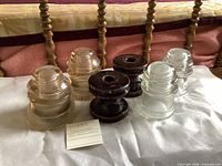 Group shot of all six insulators on table