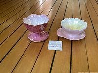 Both sundae bowls side by side on wooden floor