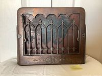 Front view of decorative metal vent cover