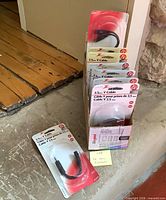 Box holding nine sealed Zenith 3.5 mm Y cables