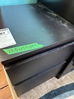 Closed view showing top and front with dimension tape