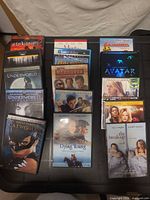 All fifteen DVD cases laid out showing front cover artwork and condition