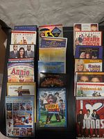 Three stacks of DVD cases showing front artwork and titles