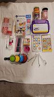 All items laid out together on cloth showing assortment