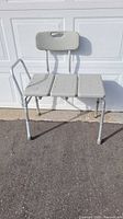 Full view of bath transfer bench showing seat, backrest, armrest and legs