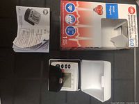 Monitor, case, manual and box laid out
