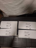 Four Living Basics hinge boxes closed on lid