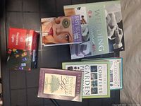 Group shot of five books and boxed LED lights