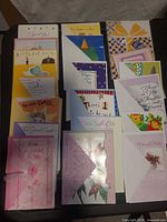 All 20 greeting cards arranged in rows showing fronts