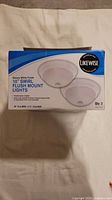 Box of Likewise 10" swirl flush mount lights, qty 2