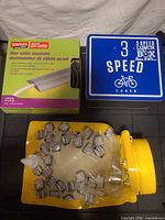 All three items grouped: concealer box, lunch box tin, Glacier bag
