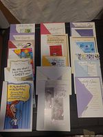 All 20 greeting cards laid out with envelopes visible