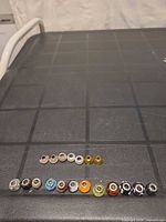 Full set of 19 beads laid out in rows showing colours and quantity