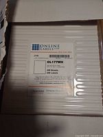 Sealed ream showing OnlineLabels branding, model OL177WX, 250 sheets