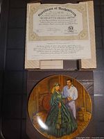 Certificate of authenticity, porcelain collector plate, and box