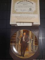 Plate in box with certificate