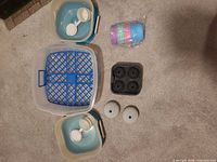 Group shot of all items including salad containers, Fish Crisp breader, ice molds, baking cups