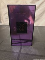 Front view of sealed perfume box showing branding and condition