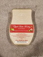 Front view of Scentsy Apple Butter Frosting wax brick showing label details