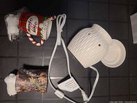 Large white textured warmer with dish, power cord, two mini plug bases and decorative sleeves (holiday striped mug and camouflage)
