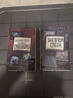 Front covers showing titles Skeleton Creek & The Crossbones and Skeleton Creek