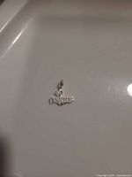 Front view of sterling silver "#1 Grandma" pendant charm