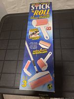 Front of Stick 'N Roll retail box showing product images and details