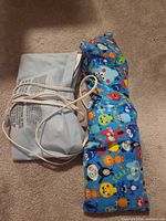 Electric heating pad and microwavable wrap side by side