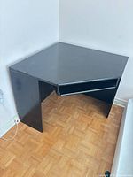 Corner desk front view showing overall shape and condition