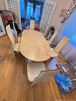 Top view of table with six chairs surrounding