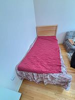 Top view of assembled twin bed showing headboard and mattress